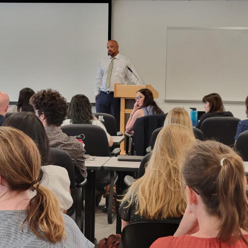 Curtis Brooks Speaking in Classroom